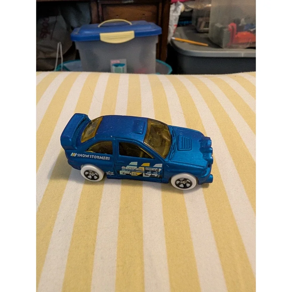Hot Wheels Ford Escort Rally Blue White Tires 1/64 Diecast 2015 HW Snow Stormers